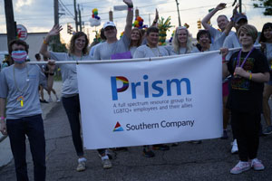 Krista Presnall with Spectrum members at Birmingham Pride. 