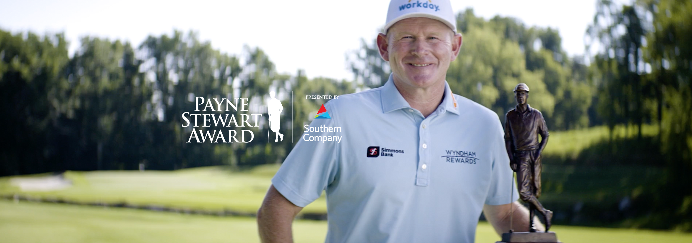 Brandt Snedeker posing with Payne Stewart Award trophy